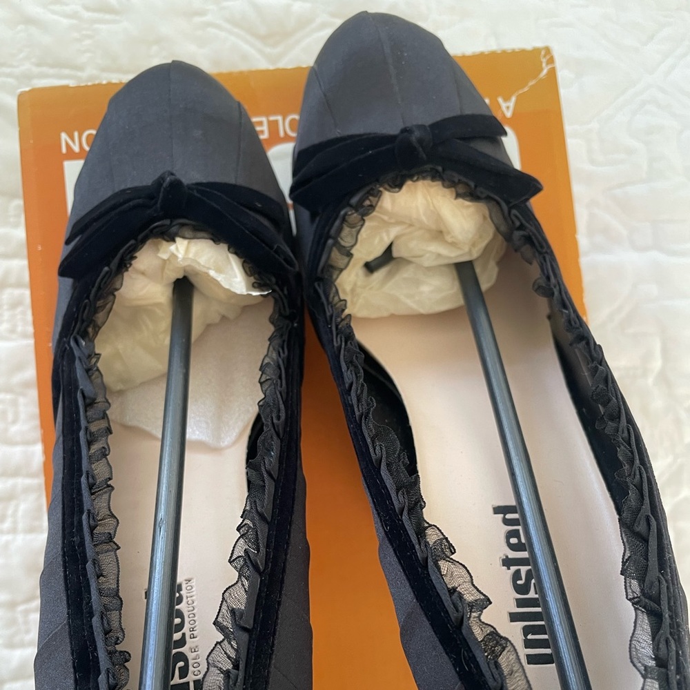 Unlisted brand party shoe. Black matte satin with velvet ribbon detailing.